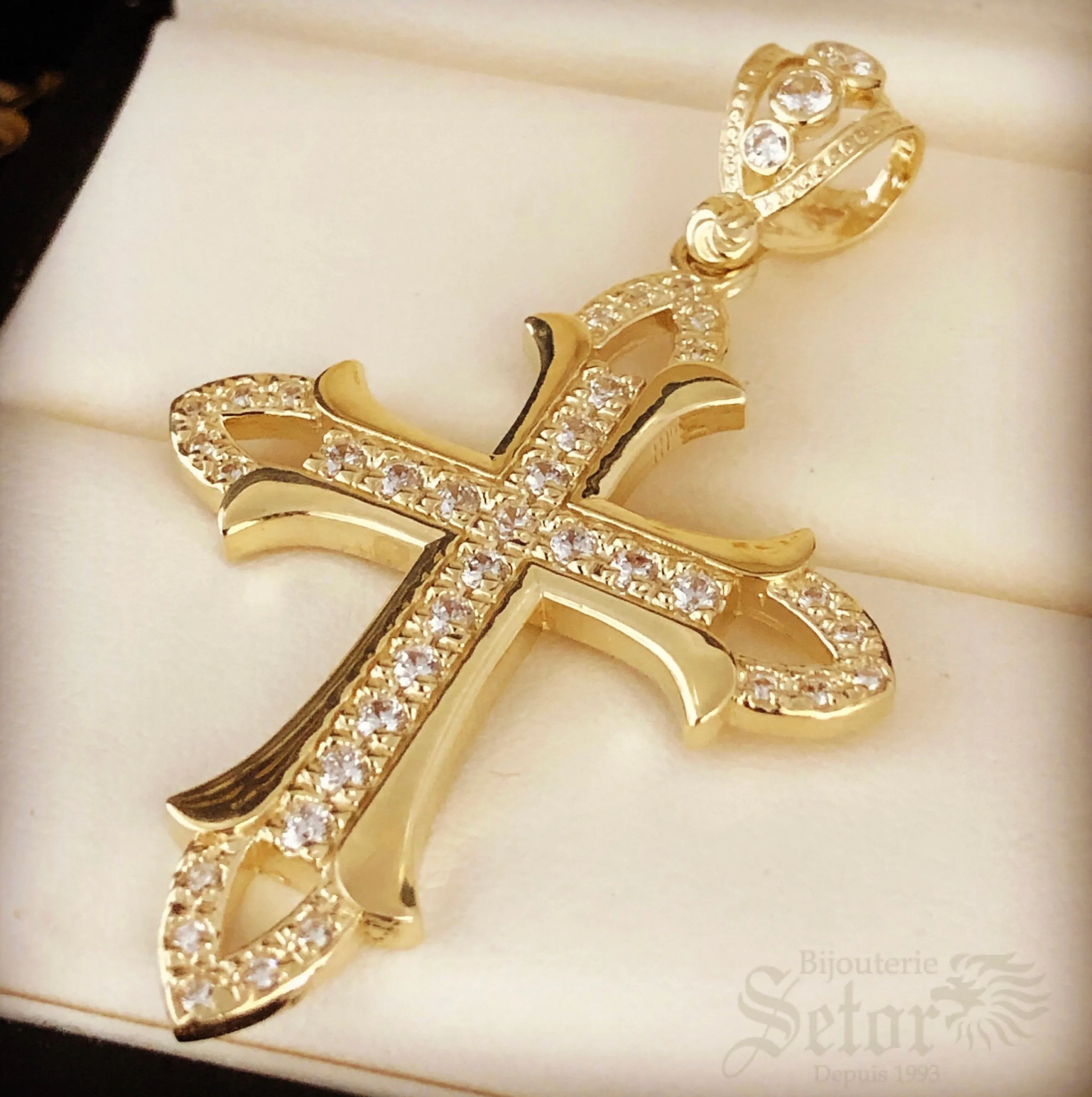 Gold cross pendant