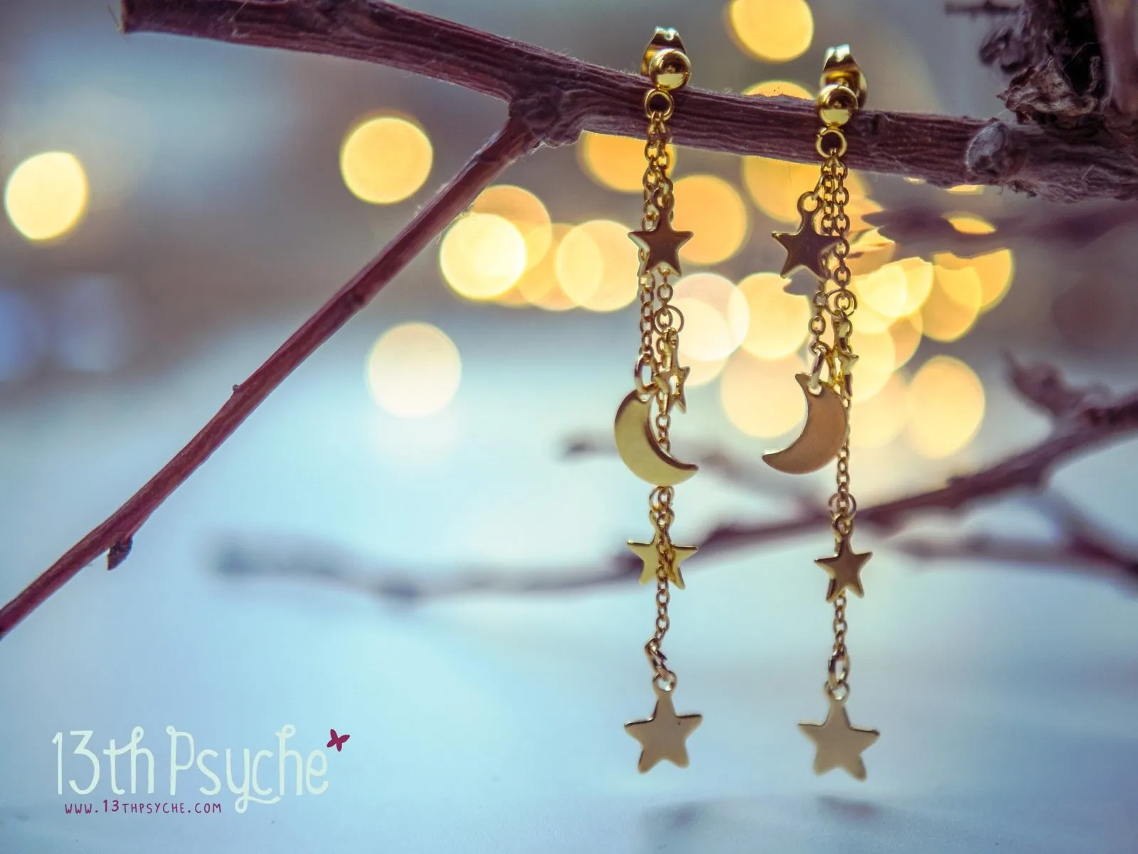 Gold moon and stars dangle earrings